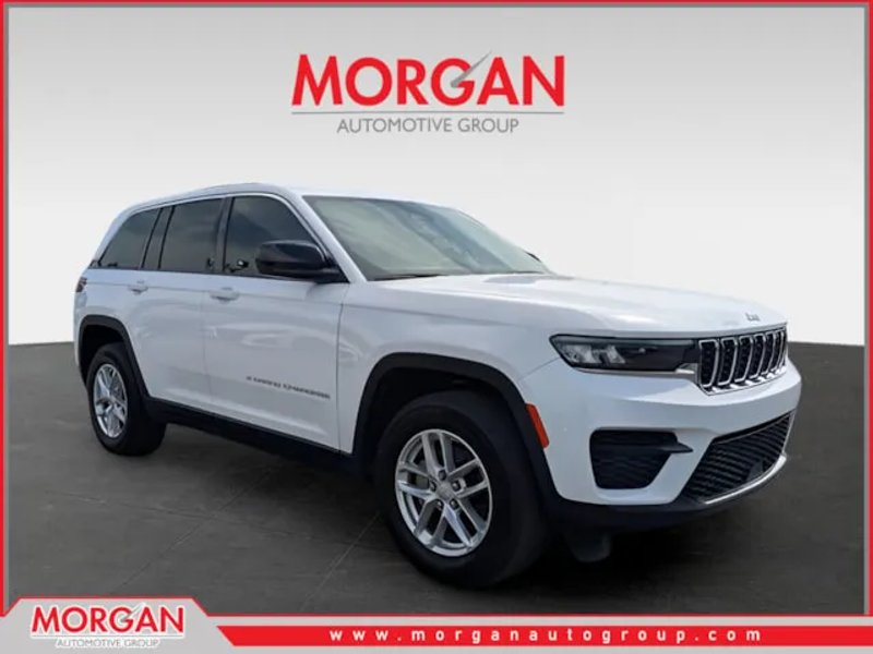 2024 Jeep Grand Cherokee Laredo in White — front three-quarter view