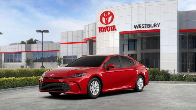 2026 Toyota Camry LE AWD in Supersonic Red — front three-quarter view
