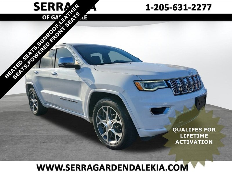2020 Jeep Grand Cherokee Overland in Ivory 3-Coat — front three-quarter view