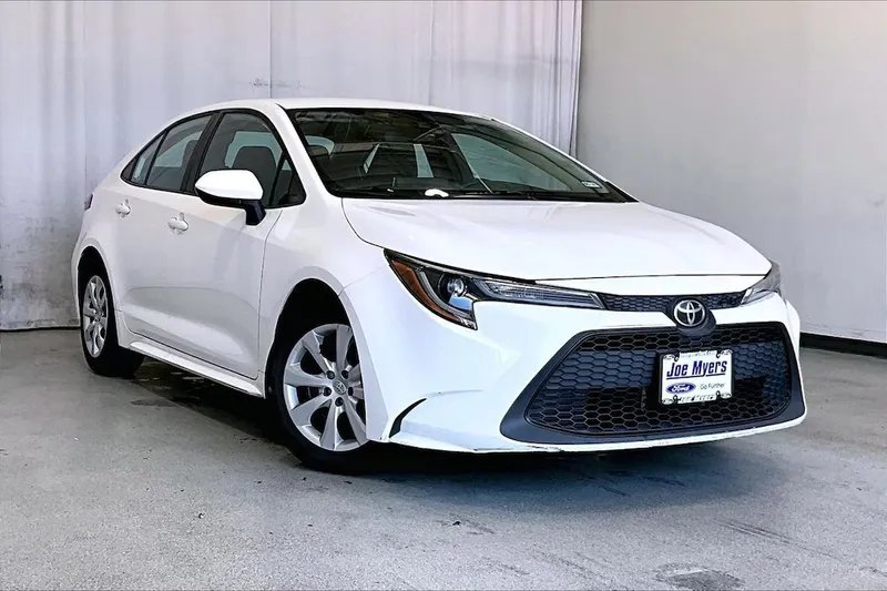 2021 Toyota Corolla in Super White — front three-quarter view