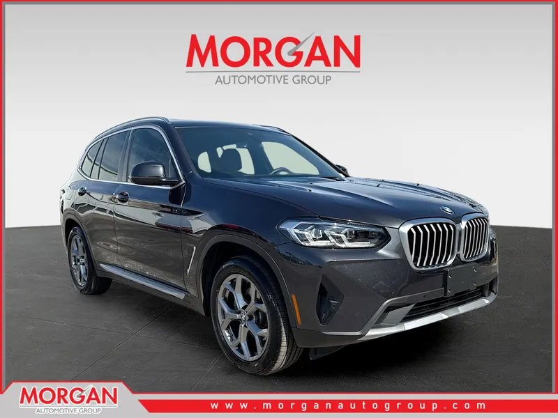 2024 BMW X3 xDrive30i in Dark Graphite Metallic — front three-quarter view
