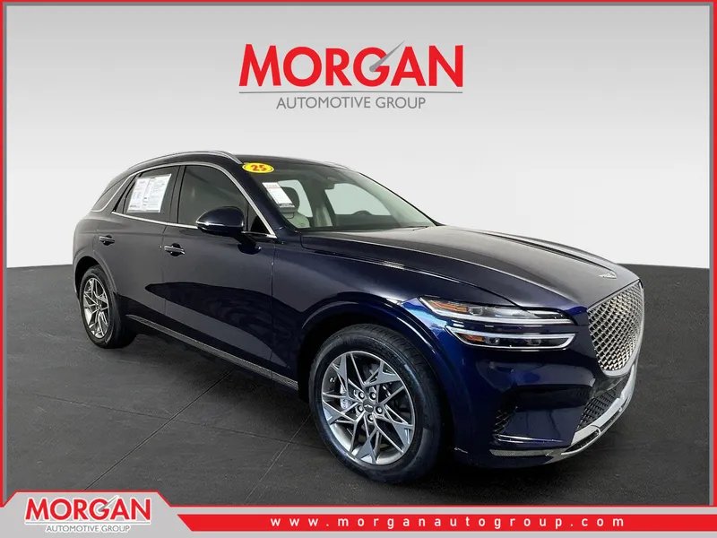 2025 Genesis GV70 2.5T in Capri Blue — front three-quarter view
