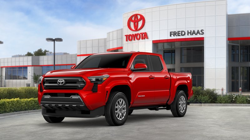 2026 Toyota Tacoma SR5 in Supersonic Red 1 — front three-quarter view