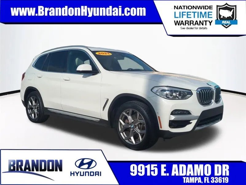 2021 BMW X3 xDrive30i in White — front three-quarter view
