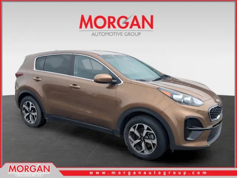 2021 Kia Sportage LX in Brown — front three-quarter view