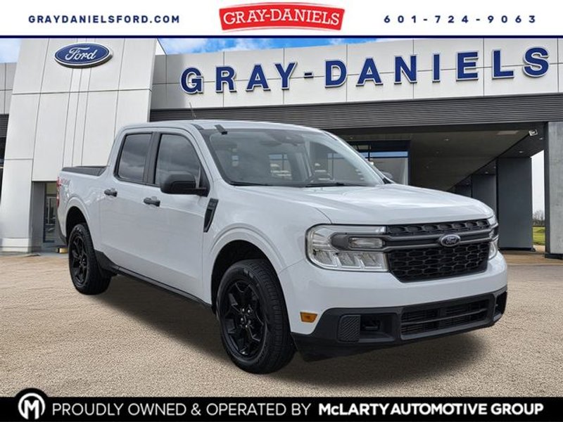 2023 Ford Maverick XLT in Oxford White — front three-quarter view