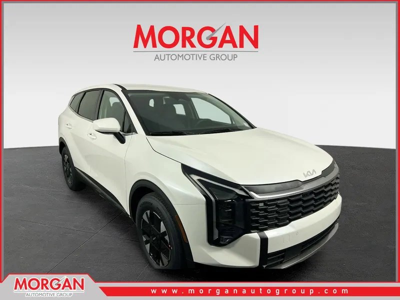 2026 Kia Sportage Hybrid LX in Snow White Pearl — front three-quarter view