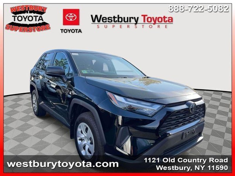 2023 Toyota RAV4 LE in Midnight Black Metallic — front three-quarter view