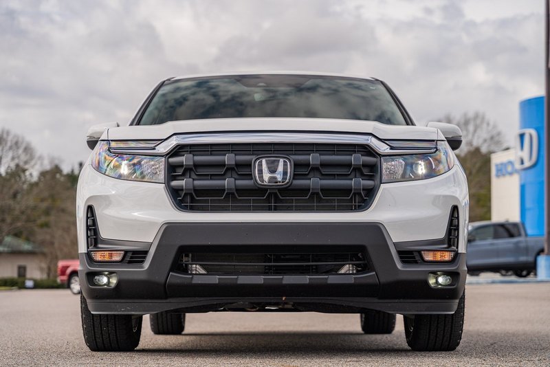 2025 Honda Ridgeline RTL in White — front three-quarter view