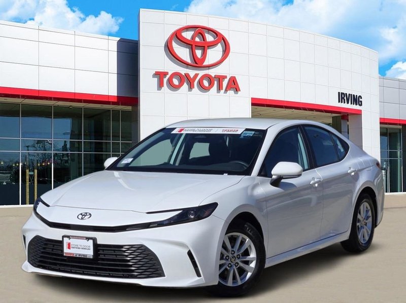 2025 Toyota Camry LE in White — front three-quarter view
