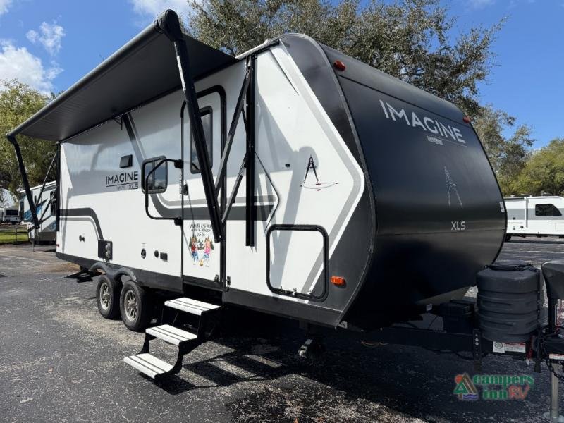 2025 Grand Design Imagine XLS in White with graphics — front three-quarter view