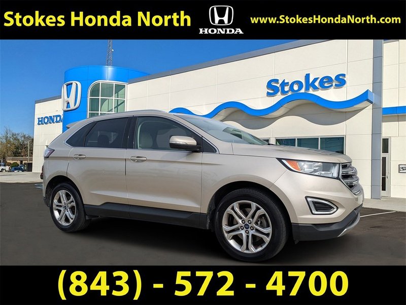 2017 Ford Edge Titanium in Gold — front three-quarter view