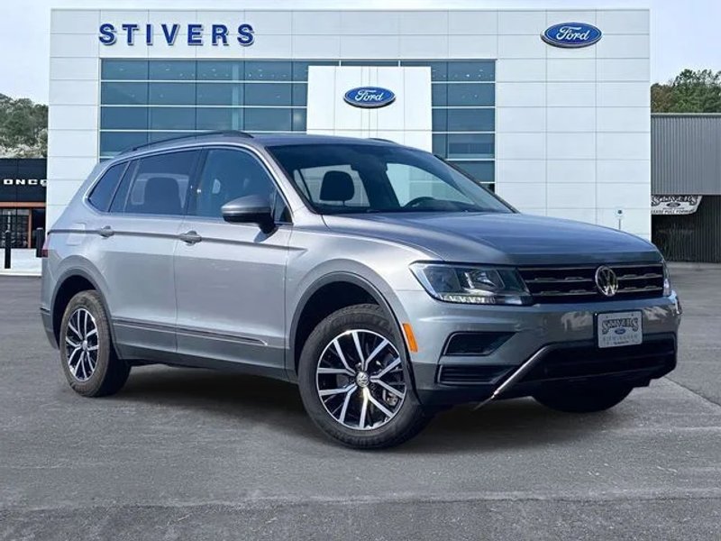 2021 Volkswagen Tiguan 2.0T SE in Pyrite Silver Metallic — front three-quarter view