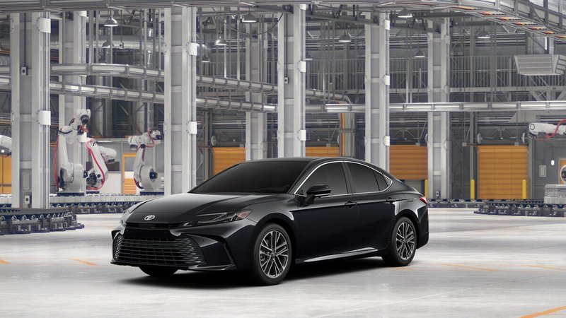 2026 Toyota Camry XLE AWD in Midnight Black Metallic — front three-quarter view