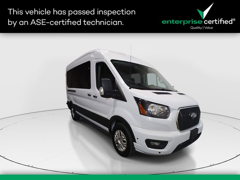 2024 Ford Transit Passenger Wagon T-350 148" Med Roof XLT RWD — front three-quarter view