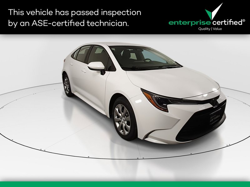 2023 Toyota Corolla LE CVT — front three-quarter view