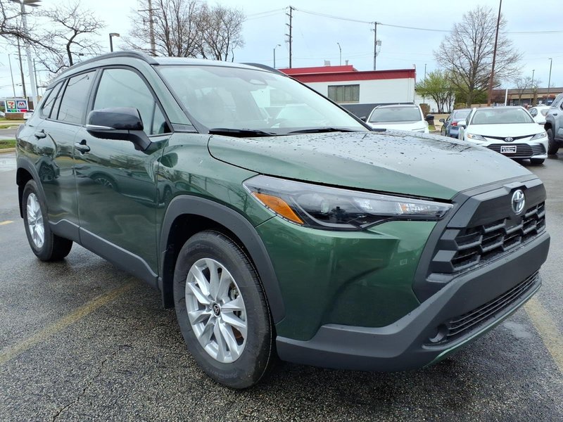 2026 Toyota Corolla Cross LE in Cypress — front three-quarter view