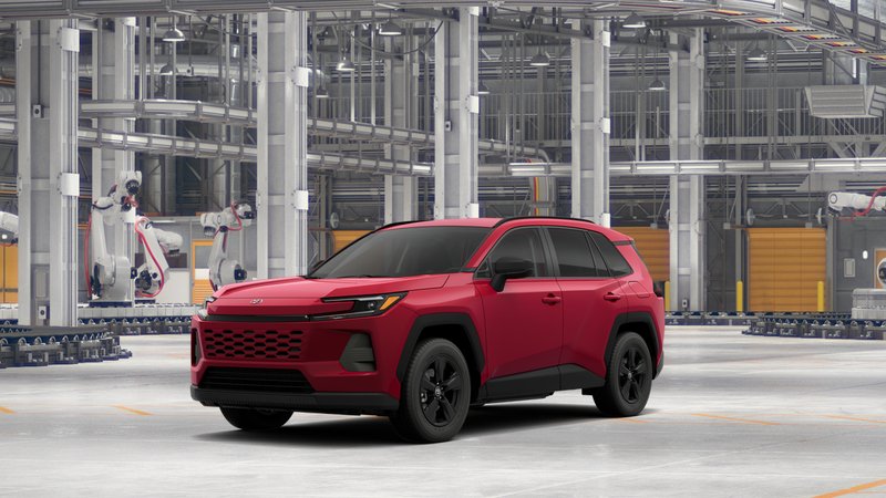 2026 Toyota RAV4 LE in Ruby Flare Pearl 1 — front three-quarter view