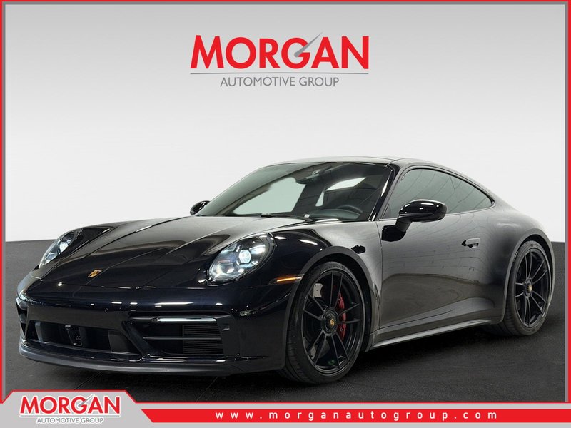 2024 Porsche 911 Carrera 4 GTS in Jet Black Metallic — front three-quarter view