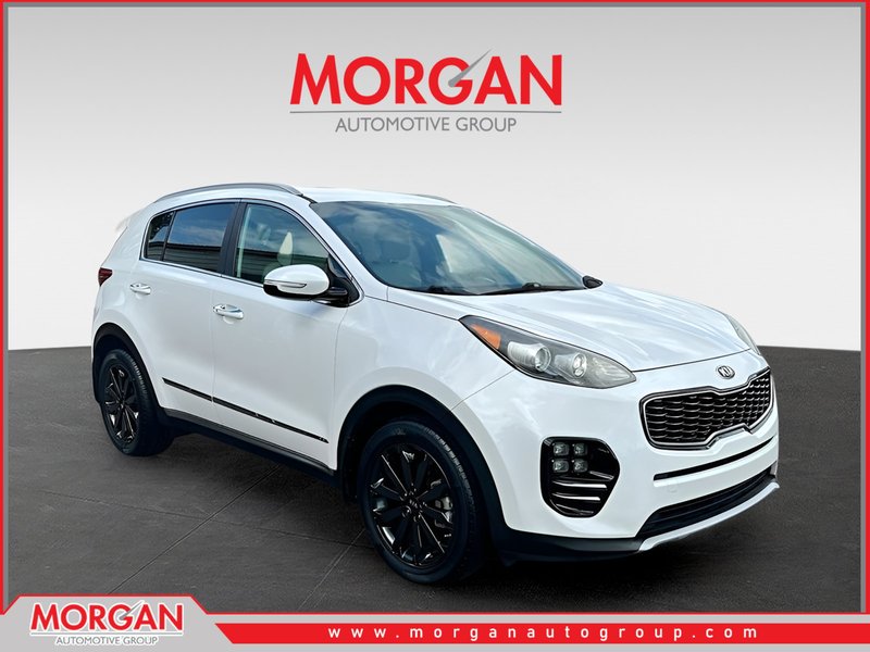 2019 Kia Sportage EX in White — front three-quarter view