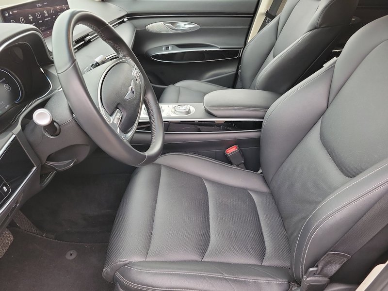 2025 Genesis GV70 2.5T AWD in Uyuni White — front three-quarter view