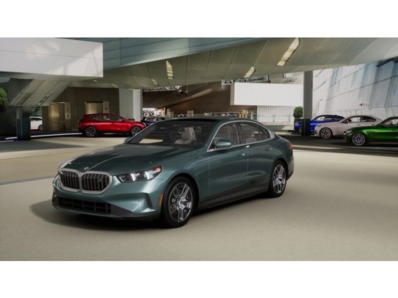 2026 BMW i5 xDrive40 in Cape York Green Metallic — front three-quarter view
