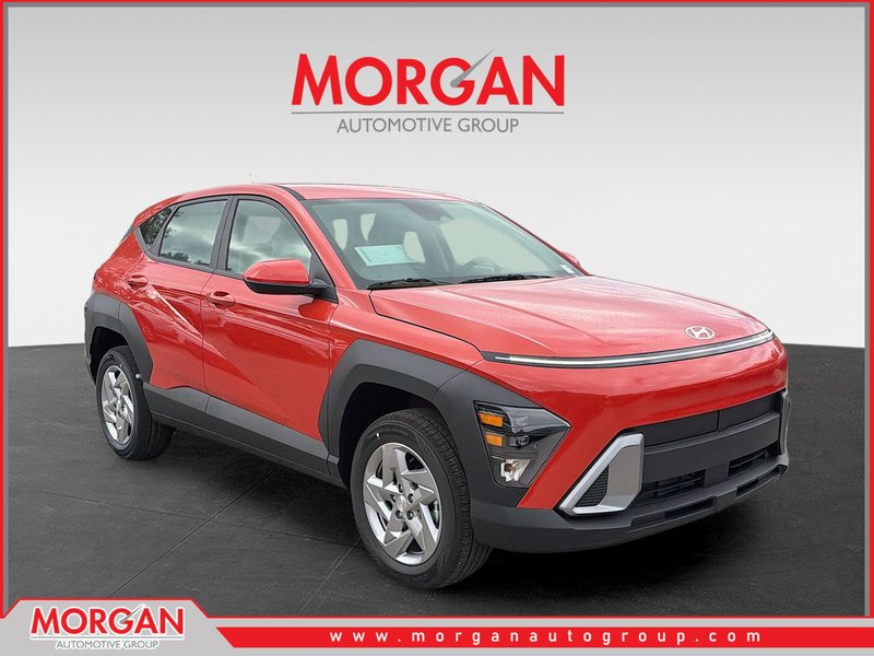 2026 Hyundai KONA SE in Soultronic Orange Pearl — front three-quarter view