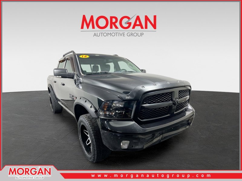 2018 Ram 1500 Big Horn in Brilliant Black Crystal Pearlcoat — front three-quarter view