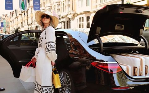 Luxury black car transportation with chauffeur