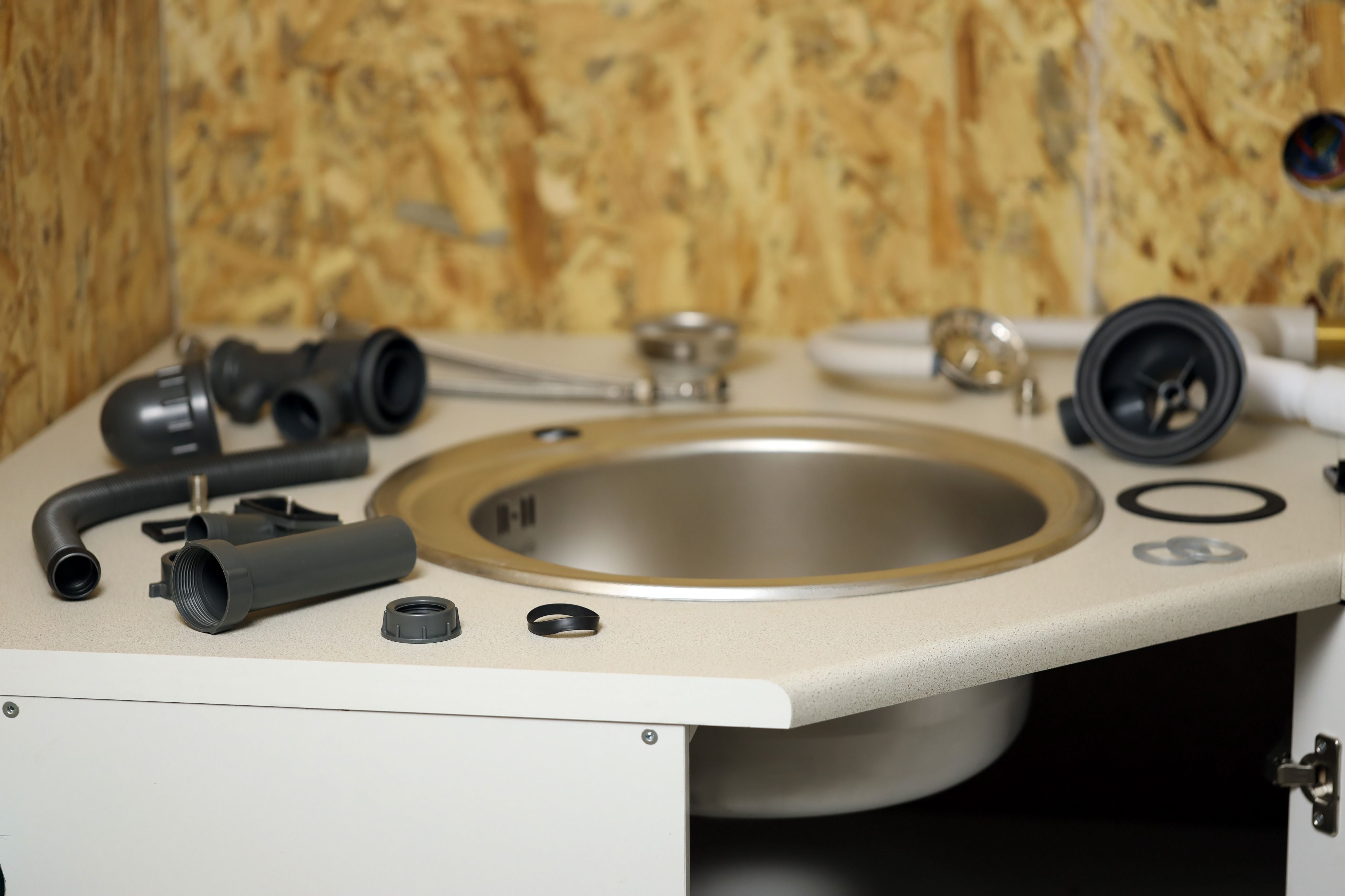 tools-and-water-tap-ready-for-installation-sink-on