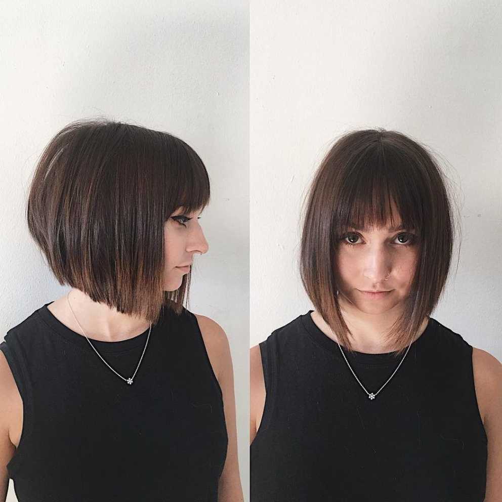 Women's Chic Blunt Angled Bob With Feathered Bangs And Brunette Regarding Well Known Posh Medium Hairstyles (Gallery 13 of 20)