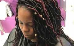 Tightly Coiled Gray Dreads Bun Hairstyles