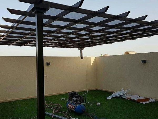 برجولة وتنسيق حديقة في حي النرجس
