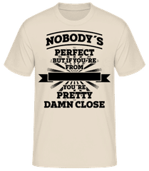 Nobody's Perfect But 1 · Men's Basic T-Shirt