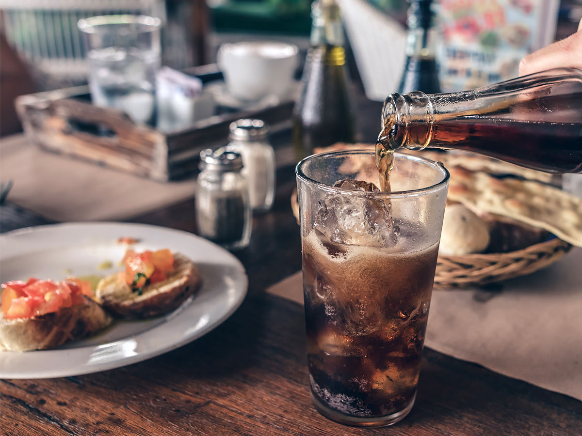 pouring soft drink