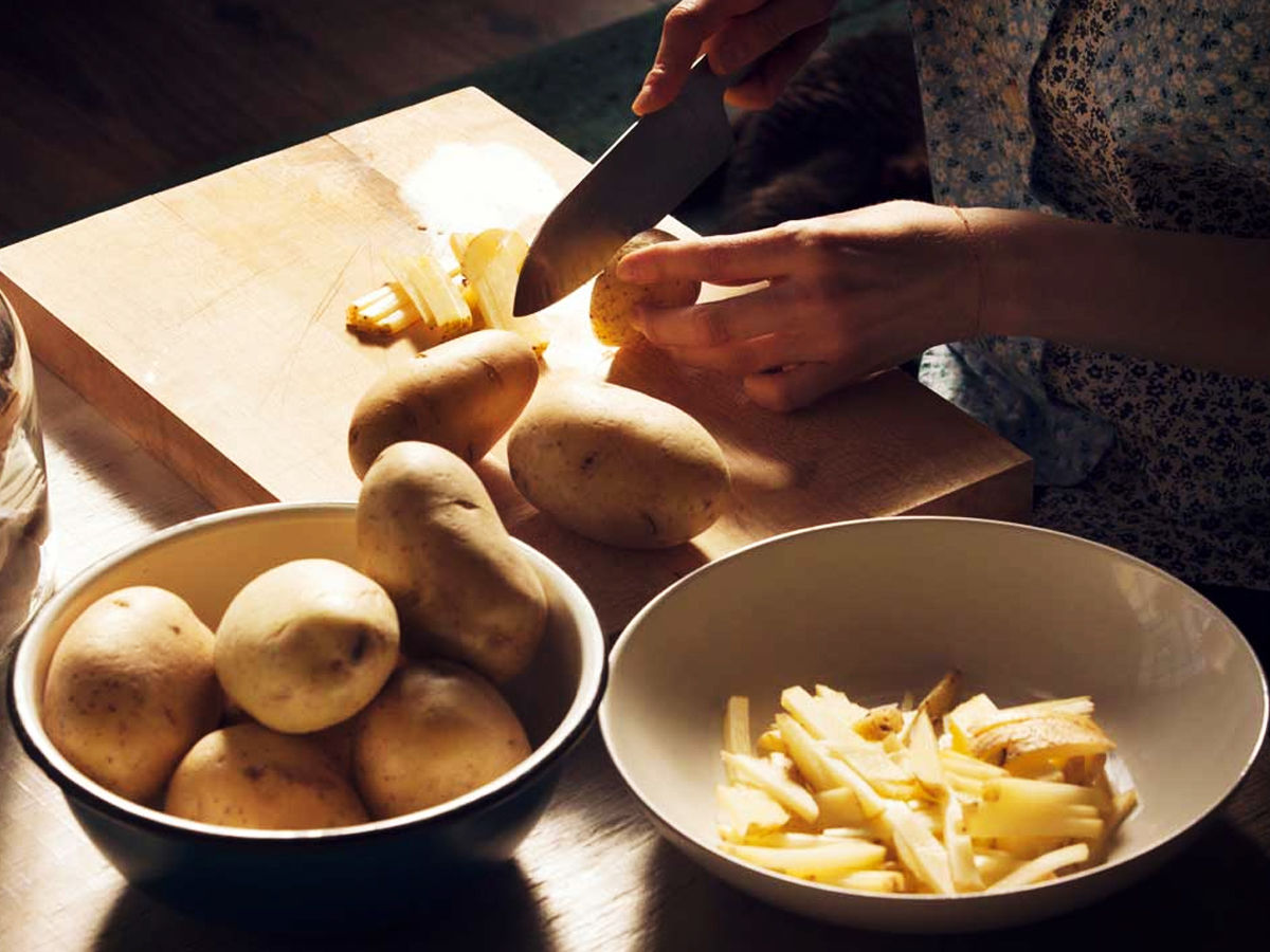 cutting potatoes