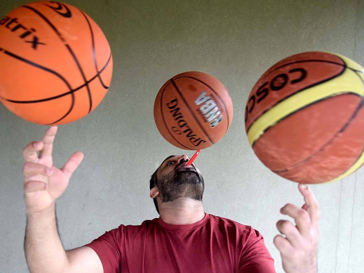 Sandeep Singh Kaila set the world record for spinning a basketball on a toothbrush