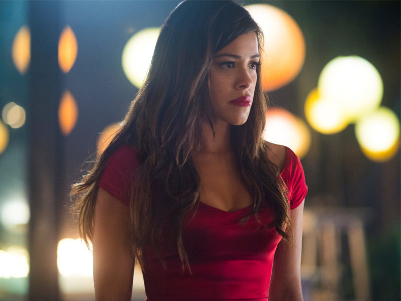 "Miss Bala’s" studio version casts Gina Rodriguez as Gloria, an American-born tough, and puts her through many of the same obstacles in order to set up the money shot in which she struts down a driveway brandishing an assault rifle. It's thrilling to see a confident woman defending herself as all hell breaks loose around her, but it's a direct contradiction of the original film's message. "Miss Bala" is no longer a critique of a system that may allow innocent people to become caught in the crossfire of the drug war, but rather the kickass origin story for a new kind of action film. Because there is no single definition or interpretation of an empowered woman, female empowerment is a difficult journey for any filmmaker to take. Patty Jenkins answered to James Cameron's call for "Wonder Woman" to be a "objectified icon” that "I believe women can and should be EVERYTHING, just like male lead characters should be,"." There is no such thing as a "right" or "wrong" powerful woman." Jenkins was absolutely correct: Empowerment isn't about how a woman looks or how strong she is physically; it's about who she is and who she becomes. In "Miss Bala," director Catherine Hardwicke faces a difficult task in portraying that journey while also attempting to make a film about the Latinx community (a historically underrepresented demographic in Hollywood cinema). She's up for the challenge of remaking the 2011 Mexican film, but she falls short, owing to underdeveloped characters and a few muddled relationships that are mismatched for the messages that screenwriter Gareth Dunnet-Alcocer is attempting to convey. Taking the premise of the original film, which was about political corruption in Mexico and its connection to beauty pageants, Hardwicke and Dunnet-Alcocer reimagine the story to fit a more Americanized narrative, focusing on Gloria (Gina Rodriguez), a Mexican-born but LA-raised woman. Gloria is a makeup artist who travels to Tijuana to support her friend Suzu (Cristina Rodlo), who is competing in the Miss Baja California pageant. The ladies go out for the night so Suzu can network with pageant executives; however, when the nightclub is raided and shot up by a Mexican cartel, Gloria manages to flee, but Suzu is nowhere to be found. Gloria quickly discovers the depths of police corruption in Mexico and is kidnapped by cartel leader Lino (Ismael Cruz Córdova, "Mary Queen of Scots”. Gloria sets out on a journey that will change her life forever after her friend goes missing, her life is in danger, and she doesn't know who to trust. Also Read, The Royal Treatment: A Cute Dream of Every Girl While "Miss Bala" deserves praise for having a cast and crew that is more than 95 percent Latinx on a film about Latinos, the majority of the characters are still drug dealers, gang members, and killers. While Dunnet-Alcocer tries to humanise Lino by providing a backstory to explain why he chose the cartel life — like many Latinx in the United States, Lino never feels completely at home on either side of the border — the script neglects to do the same for Gloria. She is defined solely by her relationship with Suzu, with nothing else to draw strength from except the trauma Lino inflicts on her. Every other character, with the exception of Suzu's younger brother, is a gang member, a corrupt politician, an abused woman, or someone who has been bought off in some way. Three non-Latinx characters are also immoral and shady in the film, but because these characters aren't seen for more than a few minutes — whereas we see multiple scenes of Mexicans being awful — it feels like a consolation prize rather than an attempt to level the playing field. In the way the two main characters are connected, there are more mixed messages. Given that he is Gloria's captor, the intense sexual tension between Gloria and Lino is quite creepy. One could argue that the tension between Rodriguez and Cruz Córdova stems from their overall attractiveness, but there's more to it. Several scenes in Hardwicke's film intentionally lead the audience to believe that a woman held captive and her abuser have romantic and sexual feelings for each other. This portrayal is very misleading in the era of #MeToo, and the knowledge that comes from listening to survivors of abuse and violence, and raises an ethical question about the ongoing presentation of a lot of violence against women in a film. Audiences can sense the emergence of a charismatic new star in Rodriguez (whose breakout role was in the 2012 Sundance discovery "Filly Brown"). That dynamic could almost be a complete reversal of the original film, in which a young woman is overwhelmed and effectively destroyed by the corruption she encounters. But, just as audiences now want to see women succeed in a system that is stacked against them, Hollywood craves a happy ending. With a shotgun blast, this mostly English-language version of "Miss Bala" accomplishes what Naranjo did with a sniper round. It may not be an improvement over the original Mexican film, but it will undoubtedly reach a larger audience.