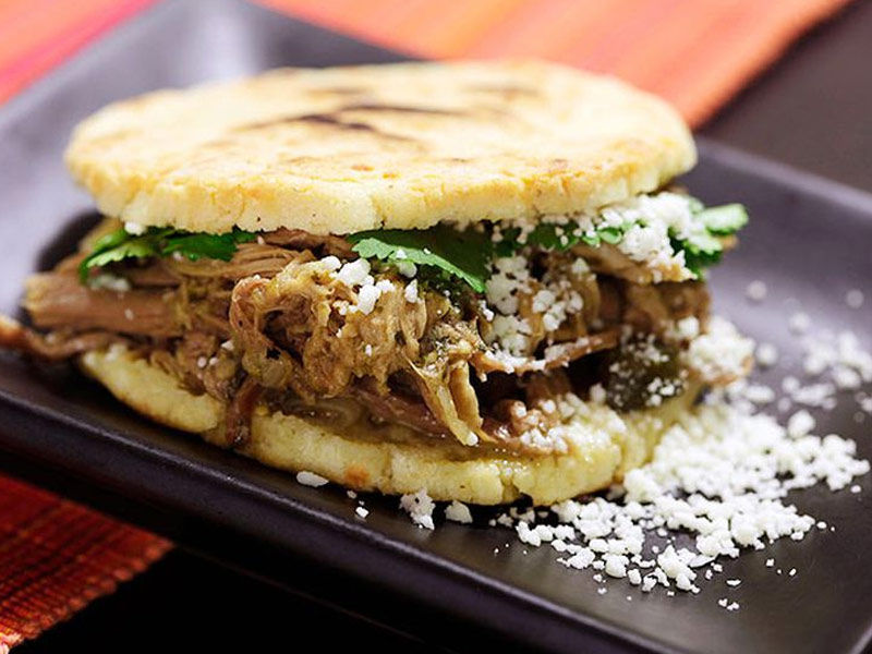 https://ik.imagekit.io/shortpedia/Voices/wp-content/uploads/2022/01/arepas@seriouseats.jpg