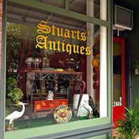 Stuart's Antiques Antique logo