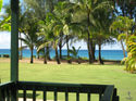 Old Style Beach House - From your lanai, across the grass, to the sand.