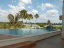 Private Luxury Complex: 12 bedrooms, 5 pools, sleeps 30: Overlooking lagoon and ocean: Akumal, Mexico - Infinity pool overlooking lagoon