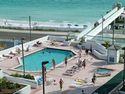 Front Corner Condo with 50 balcony overlooking the Gulf - Large heated pool, kiddie pool, 2 large spas