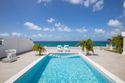 LA PERLA BIANCA... Very Cool, Luxurious Romantic Hideaway on Baie Rouge Beach - La Perla Bianca... 1BR vacation rental on Baie Rouge Beach, St Martin