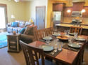 Aloha Bear - The dining room is open to the living room and kitchen for an open feel.