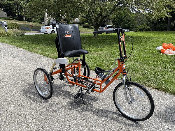 Patrick’s new Freedom Concepts adaptive bike is decorated in Flyers orange and black and customized to fit his mobility needs.