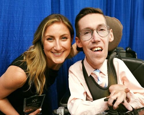 two people smiling