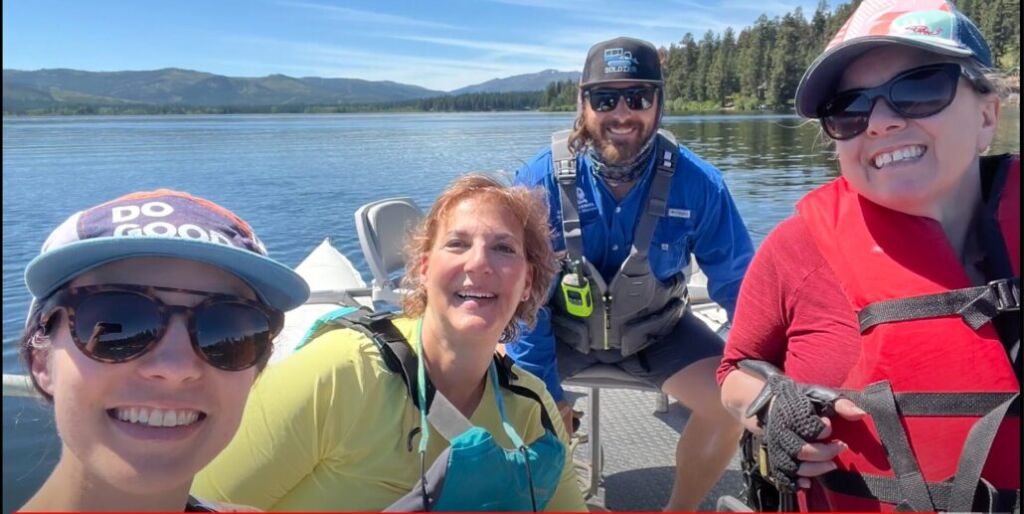 in the boat with friends