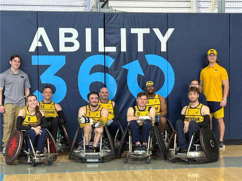 Andy Zimmer from Help Hope Live at Ability360 Rugby Rave with his team including Chuck Aoki.