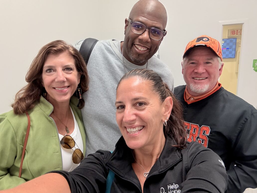 Selfie with Stephanie McAlaine, Kelly L Green from Help Hope Live, and Barrett Brooks in October 2025.